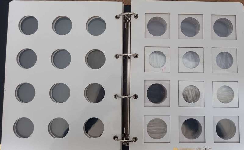 8 PAGE COIN FLIP FILE IN GOOD CONDITION. STORES 96 COINFLIPS.