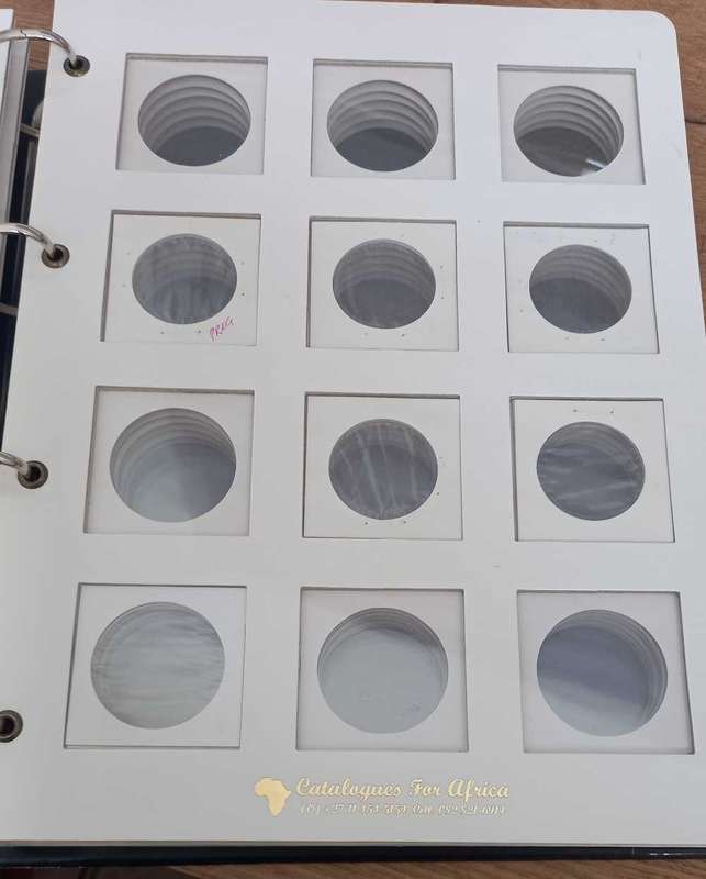 8 PAGE COIN FLIP FILE IN GOOD CONDITION. STORES 96 COINFLIPS.