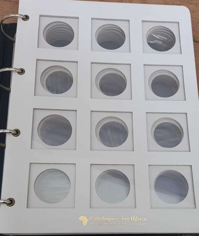 8 PAGE COIN FLIP FILE IN GOOD CONDITION. STORES 96 COINFLIPS.