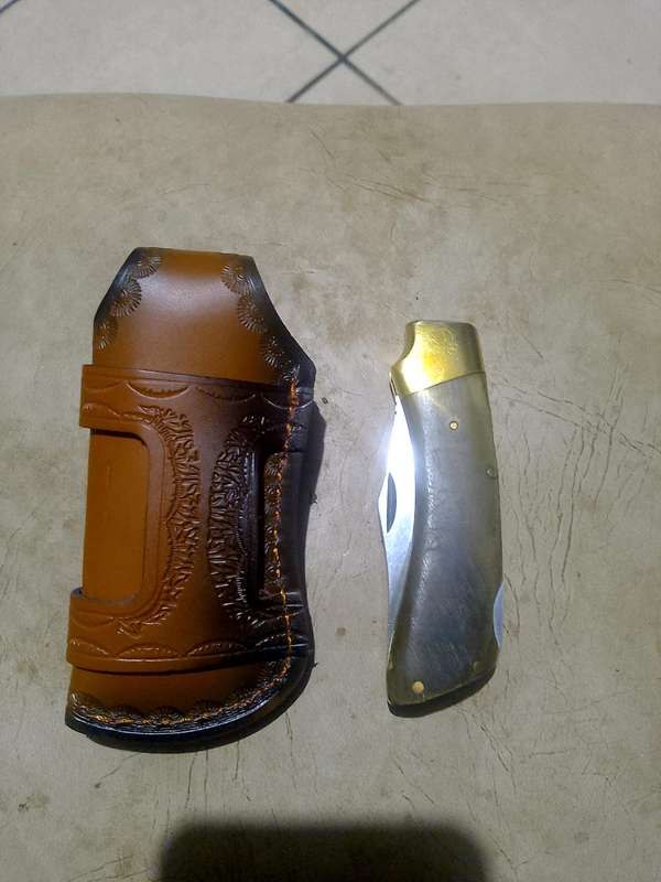 Smith and Wesson Hunting Knife with Genuine Leather Sheath and 1995 RUGBY WORLD CUP FOLDING KNIFE.