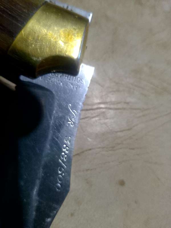 Smith and Wesson Hunting Knife with Genuine Leather Sheath and 1995 RUGBY WORLD CUP FOLDING KNIFE.