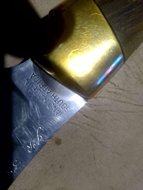 Smith and Wesson Hunting Knife with Genuine Leather Sheath and 1995 RUGBY WORLD CUP FOLDING KNIFE.
