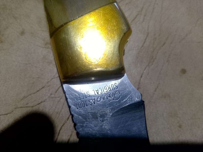 Smith and Wesson Hunting Knife with Genuine Leather Sheath and 1995 RUGBY WORLD CUP FOLDING KNIFE.