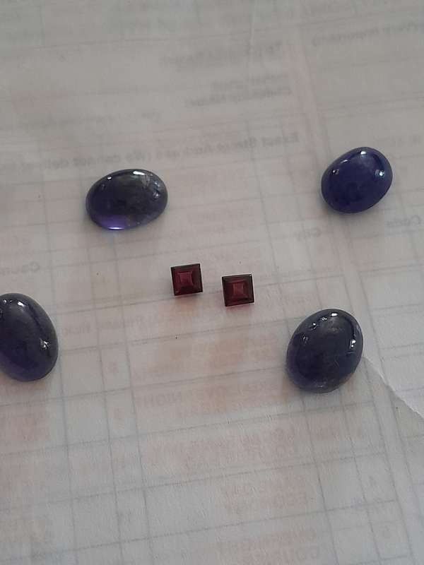 Natural 0.95 Ct Garnet Pair. + 5.5 Ct Lolite Cabs