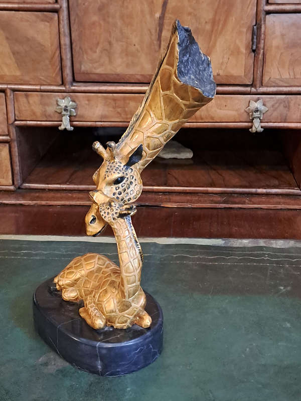 Beautiful bronze Giraffe mom and calf