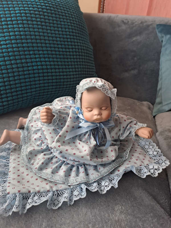 Vintage music and moving porcelain baby doll