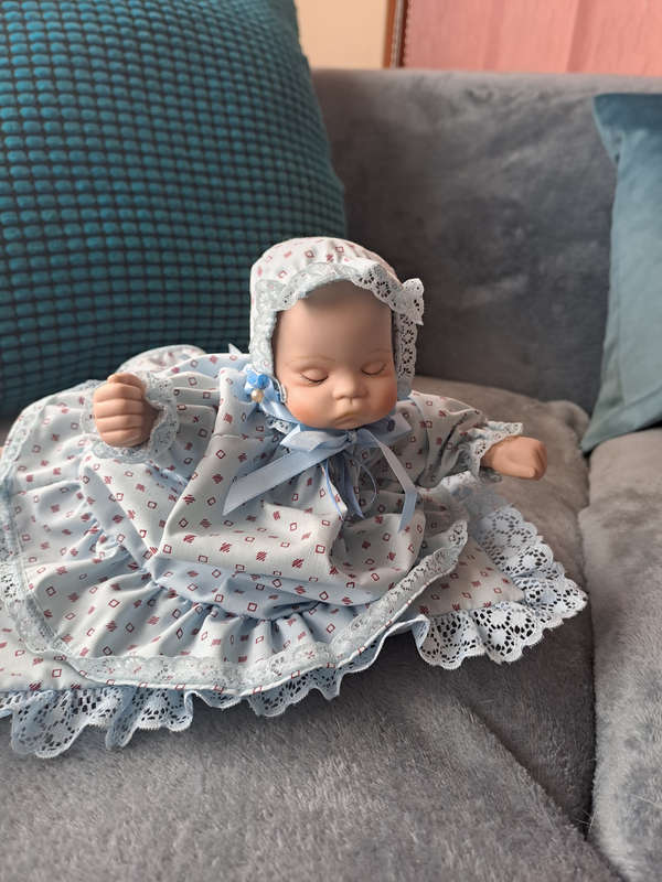 Vintage music and moving porcelain baby doll