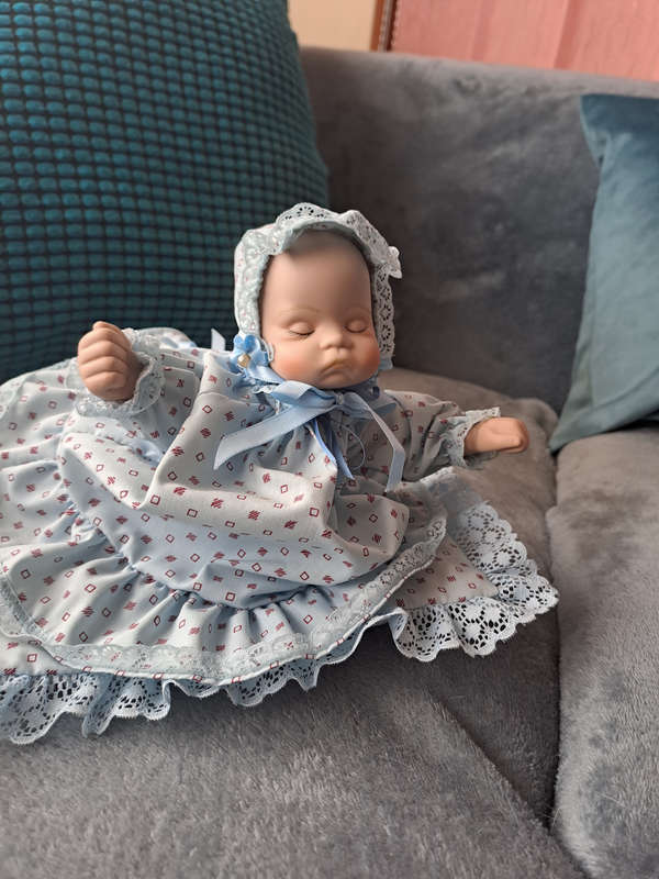 Vintage music and moving porcelain baby doll