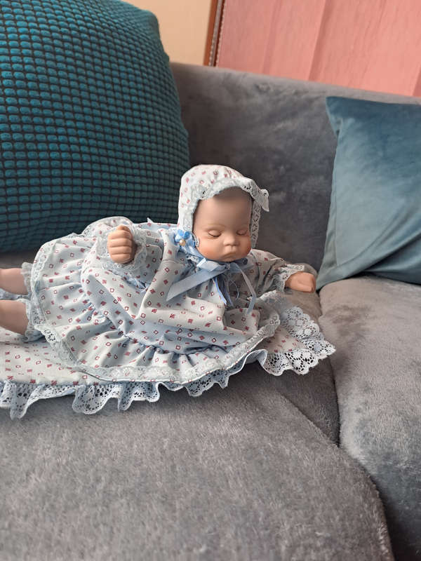 Vintage music and moving porcelain baby doll