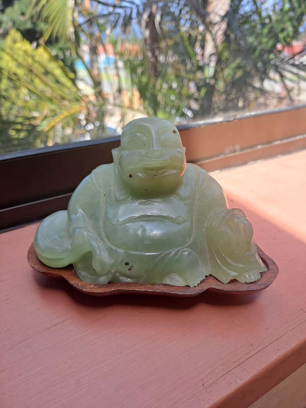 Chinese jade stone laughing buddha on wood base