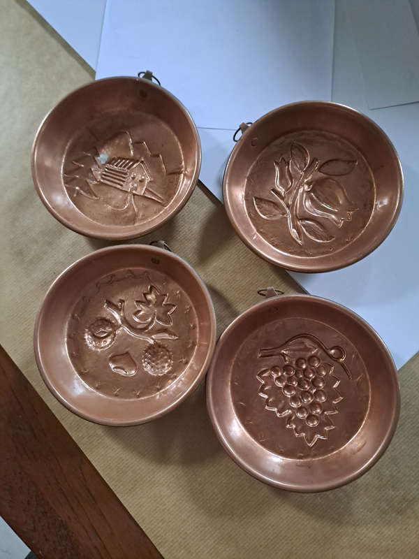 set of four copper moulds