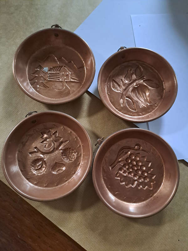 set of four copper moulds
