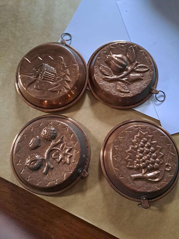 set of four copper moulds