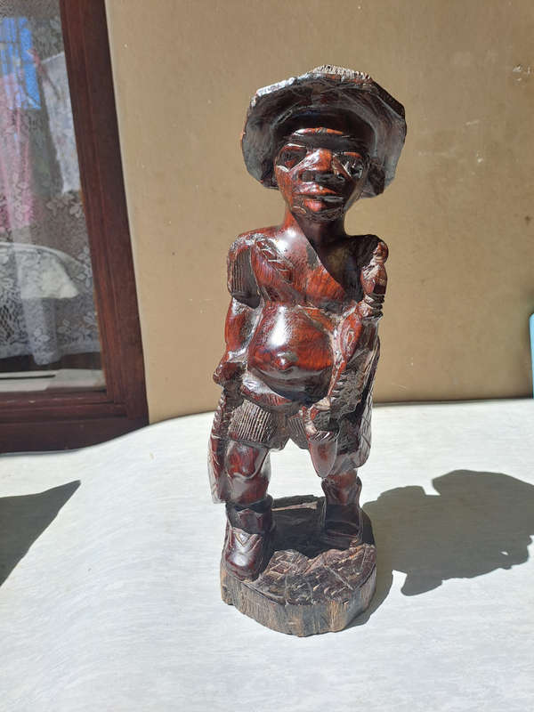 Traditional hand carved Malawian fisherman very niceley detailed 40cm