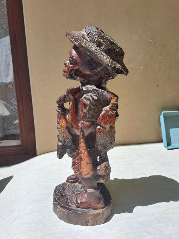 Traditional hand carved Malawian fisherman very niceley detailed 40cm