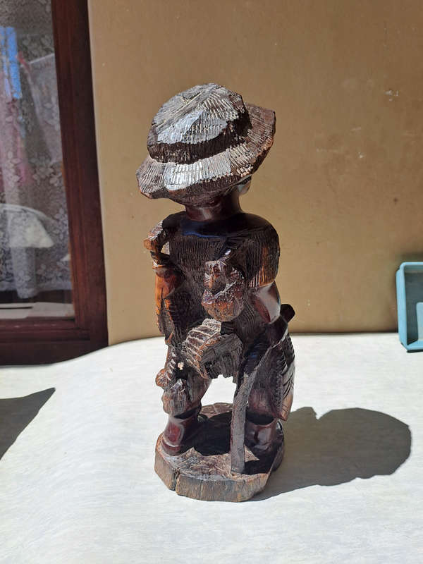 Traditional hand carved Malawian fisherman very niceley detailed 40cm