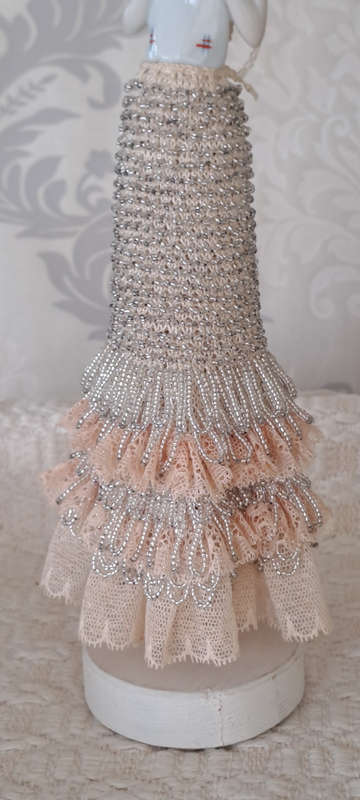 Stunning Tall hand beaded and 1/2body porcelain figurine ONE OF A KIND
