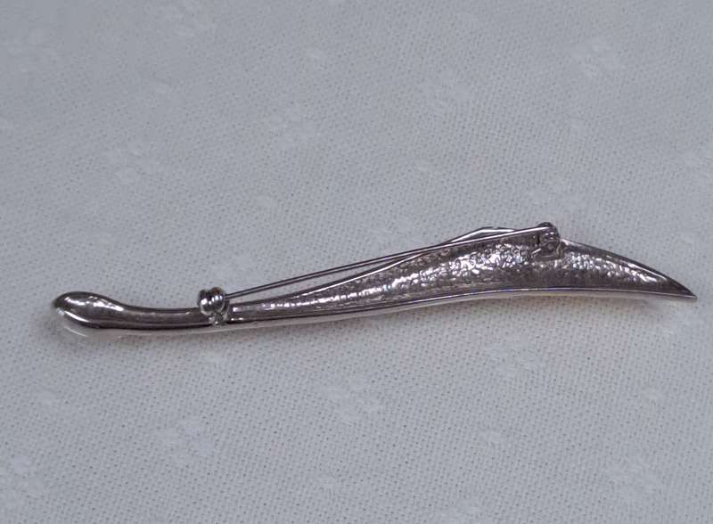 Beautiful vintage swirl bar brooch with gold and silver and stone