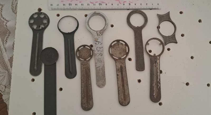 Set of 9 various vintage case back openers