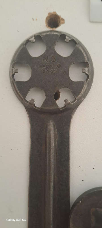 Set of 9 various vintage case back openers