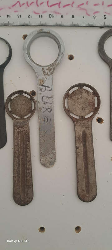 Set of 9 various vintage case back openers