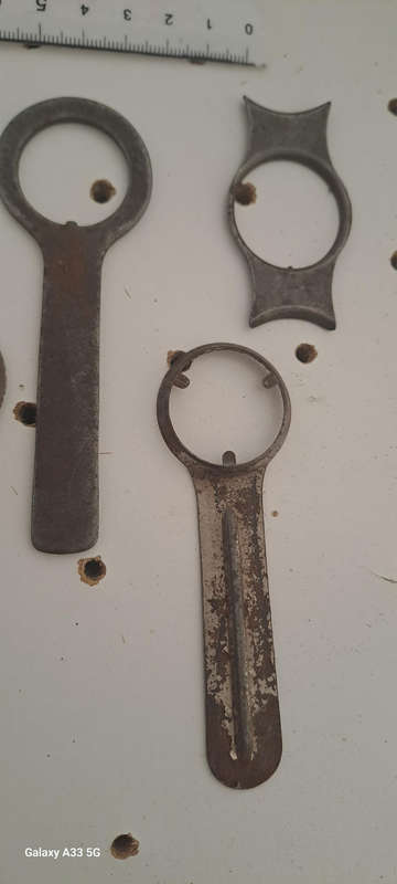 Set of 9 various vintage case back openers