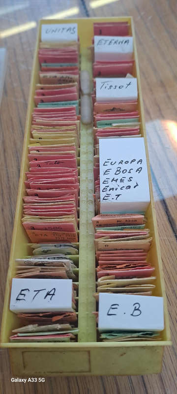 box of 100`s, sorted and originally packed new vintage watch balance staffs Reduced