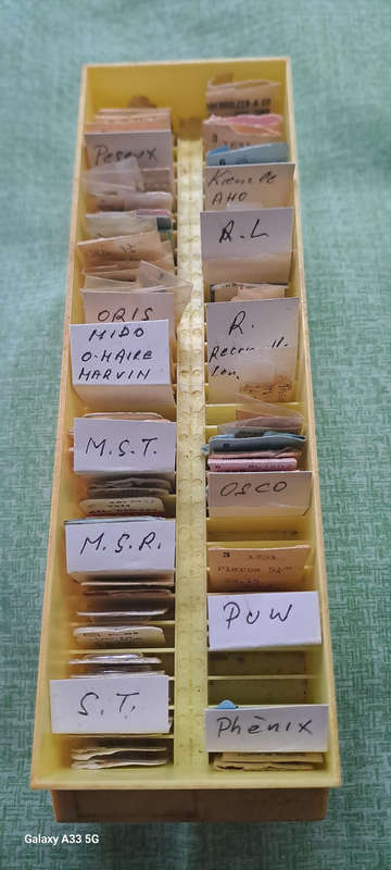 box of 100`s, sorted and originally packed new vintage watch winding stems multiple per pack