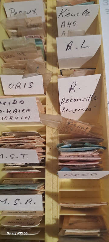box of 100`s, sorted and originally packed new vintage watch winding stems multiple per pack
