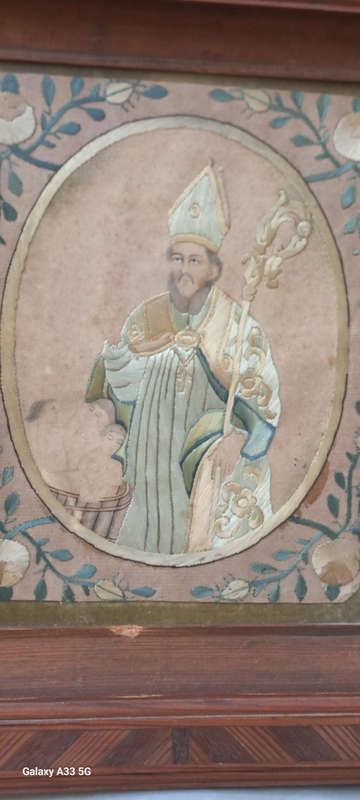 A unique one of a kind silk stitched picture of St Nicholas who brought the children back to life
