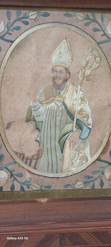 A unique one of a kind silk stitched picture of St Nicholas who brought the children back to life