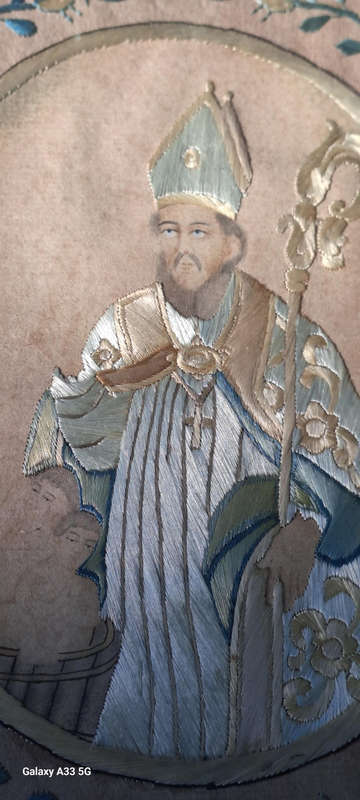 A unique one of a kind silk stitched picture of St Nicholas who brought the children back to life