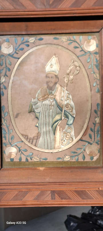 A unique one of a kind silk stitched picture of St Nicholas who brought the children back to life