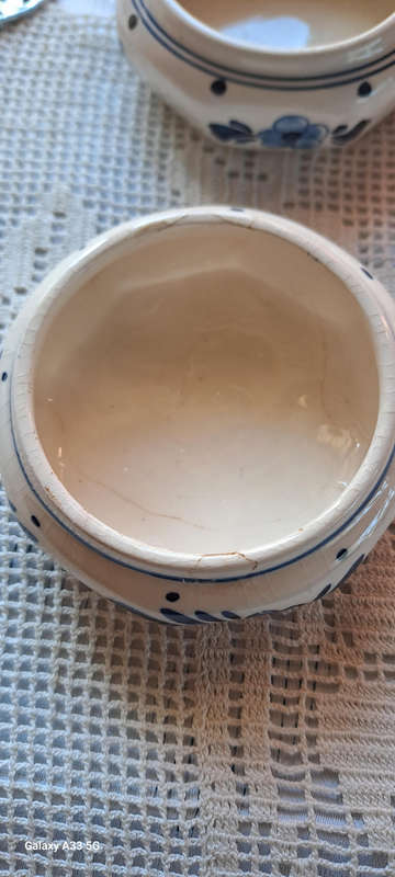 Delft tea strainer and extra cup