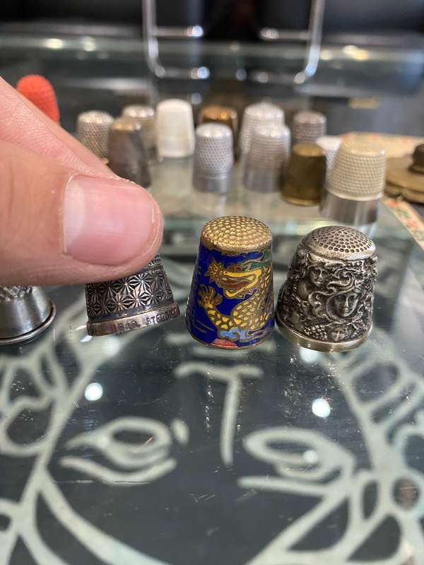 Sterling silver, enamel, painted and metal thimbles collection. Bid now!