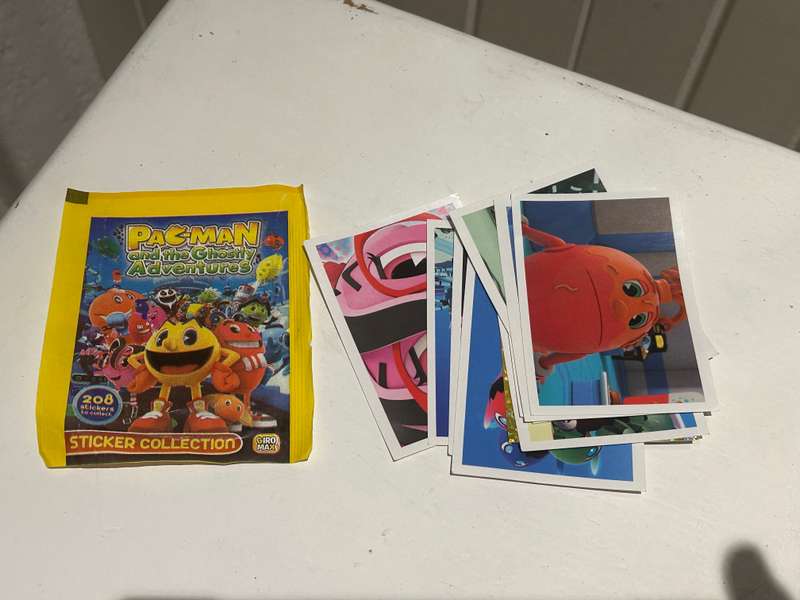 An open pack of 13 PAC-MAN and the Ghostly adventures stickers