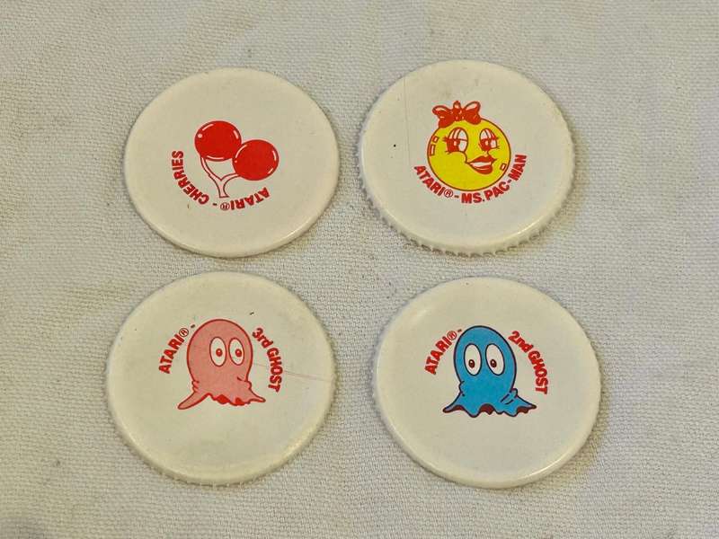 A Genuine South African Coca Cola 1983 MISS PAC-MAN larger 1.5L Bottle Liner competition set of 4