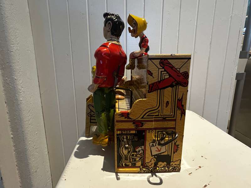 1945 LIL ABNER & HIS DOG BATCH BAND Tinplate windup toy by the Unique Art Manufacturing Company