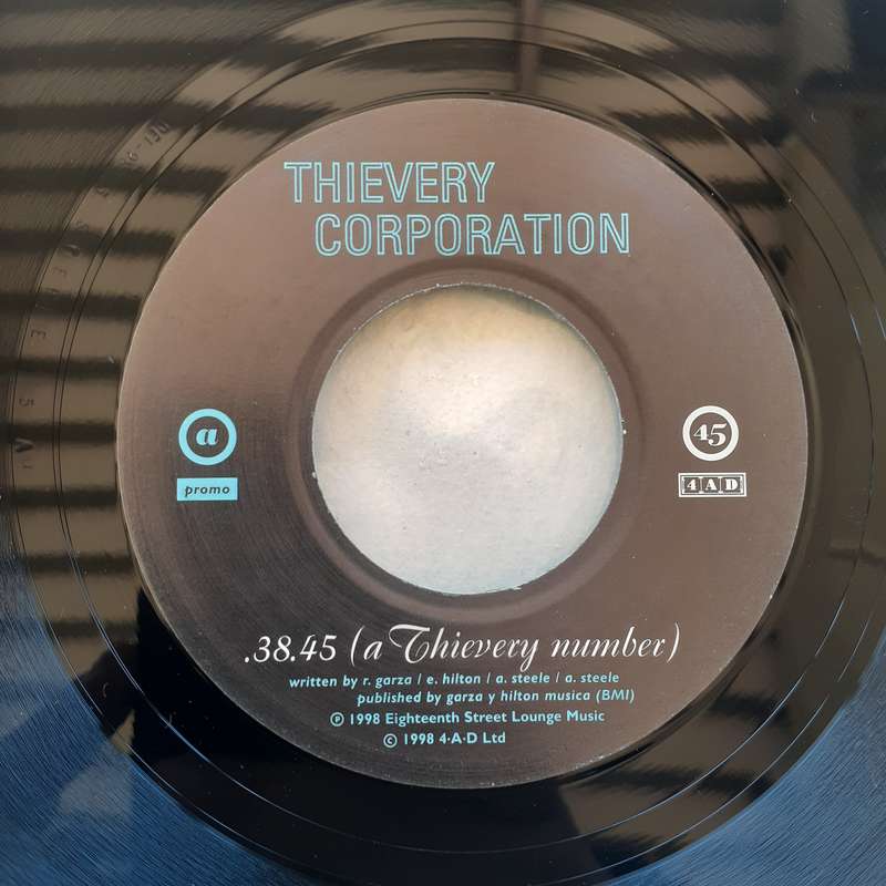 VINYL - Thievery Corporation - .38.45 (A Thievery Number) / Assault On Babylon [45 RPM PROMO LP] [D]