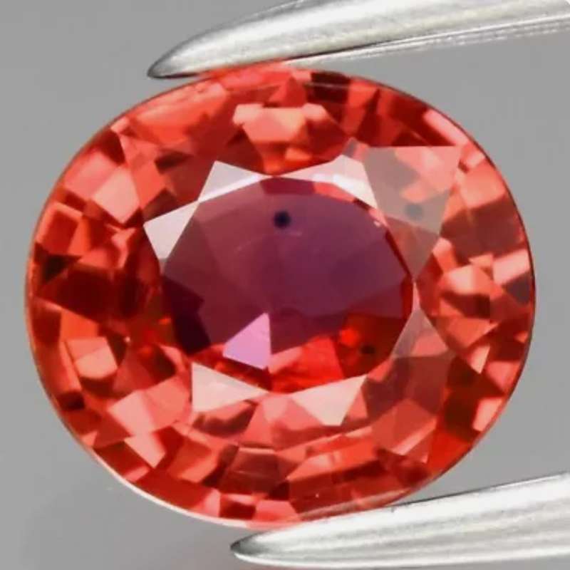 Beautiful! 5.5 x 5mm Oval Cut Natural Pinkish Orange Sapphire