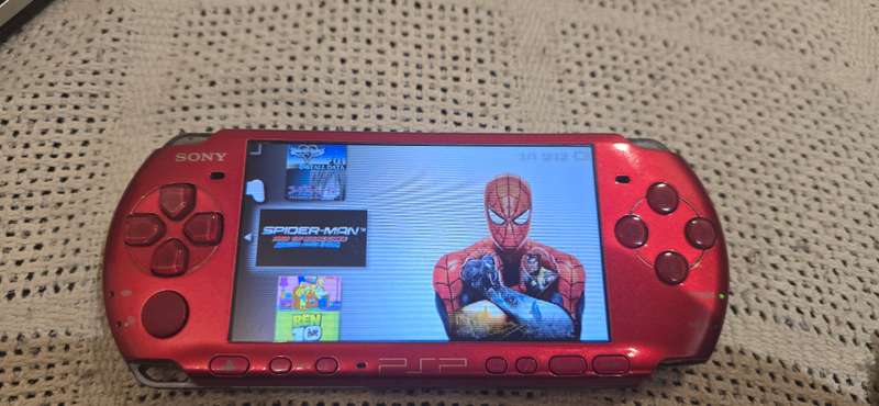 Red Psps 3000 modded 64gb loaded with 65+ games