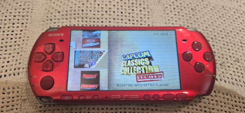 Red Psps 3000 modded 64gb loaded with 65+ games