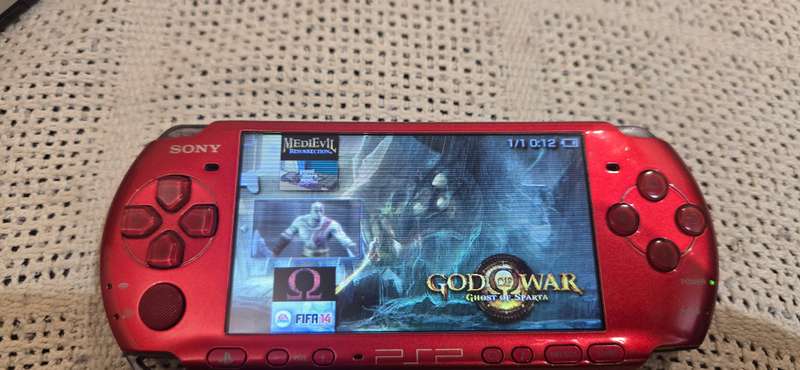 Red Psps 3000 modded 64gb loaded with 65+ games
