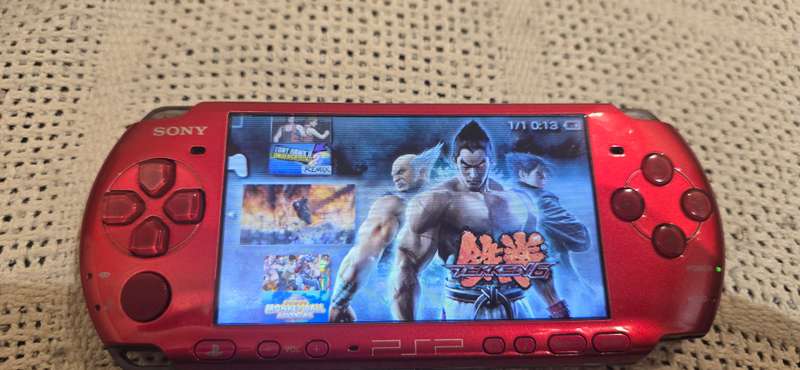 Red Psps 3000 modded 64gb loaded with 65+ games