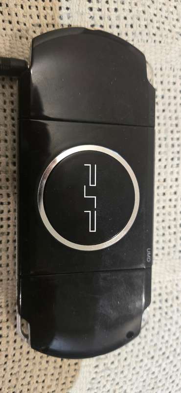 listing 1 PSP 3000 modded 64gb 60+games loaded