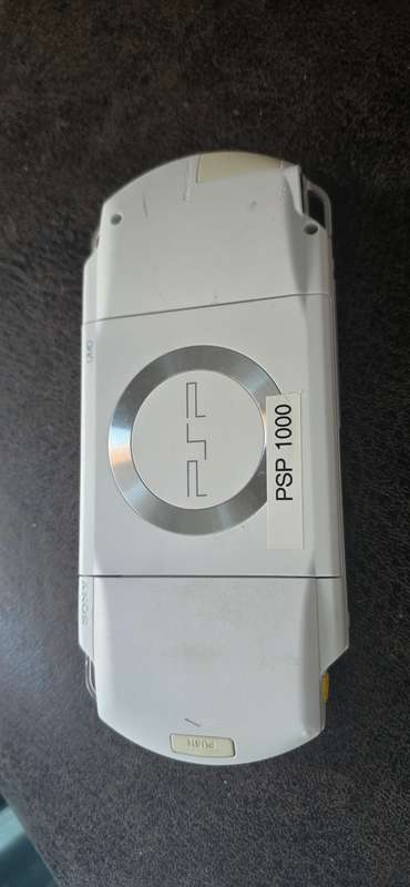 listing 1 PSP 1000 modded 64gb 60+games whiteames loaded