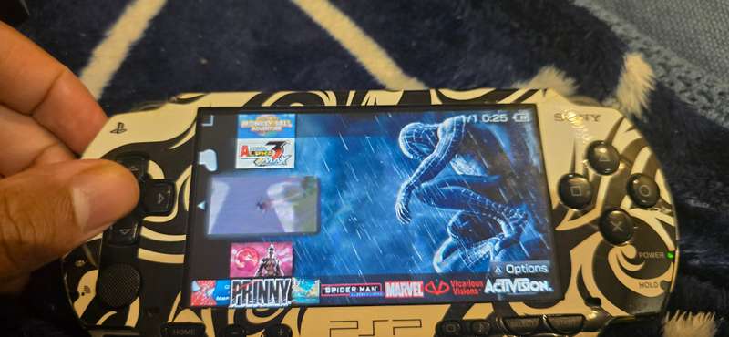 listing 1 PSP 1000 modded 64gb 60+games whiteames loaded