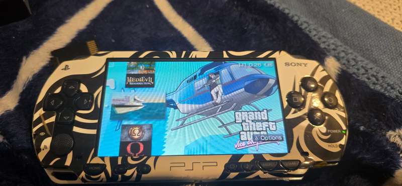 listing 1 PSP 1000 modded 64gb 60+games whiteames loaded