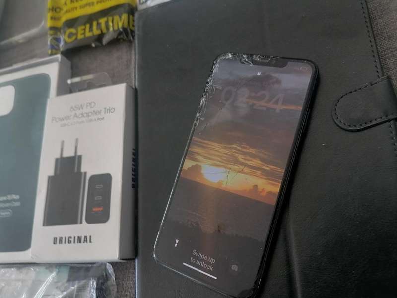 LOT OF APPLE PHONE, TABLET,NEW PHONE COVERS , ETC, ONE BID FOR THE LOT*