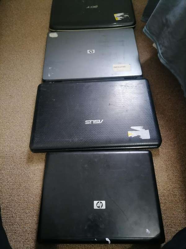 LOT OF 4 LAPTOPS FOR SPARES OR REPAIRS